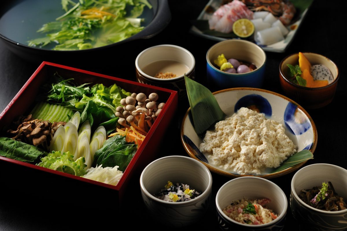 Okinawan dishes including fresh tofu, vegetables and fruit